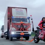 Watch rider attempt to tow 7-ton truck with her electric motorcycle