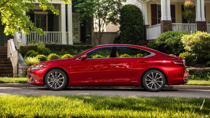 Side profile shot of a red 2019 Lexus ES 300h