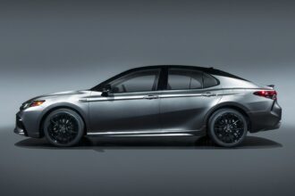 Side profile shot of the 2021 Toyota Camry XSE Hybrid