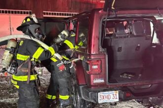 Hybrid vehicle catches fire while charging inside Wayland garage