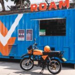 ROAM rolls out solar-powered electric motorcycle hubs for fast charging and battery rentals