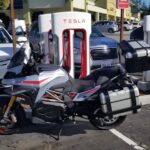 Long range electric motorcycles are now charging up at Tesla Superchargers