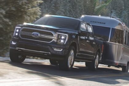 Image of F-150 Hybrid towing courtesy of Ford