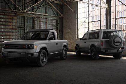 Slate EV truck and SUV upgrade next to each other in warehouse
