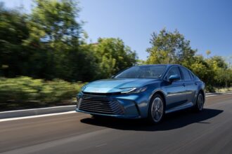 Front 3/4 action shot of a 2025 Toyota Camry