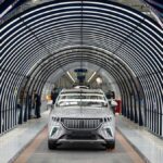 Employees work on a car assembly line at a Togg factory at the Gemlik Togg Technology Campus, Bursa, northwestern Türkiye, May 17, 2024. (AFP Photo)