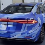 Spy shots reveal Geely's 2,100km hybrid sedan